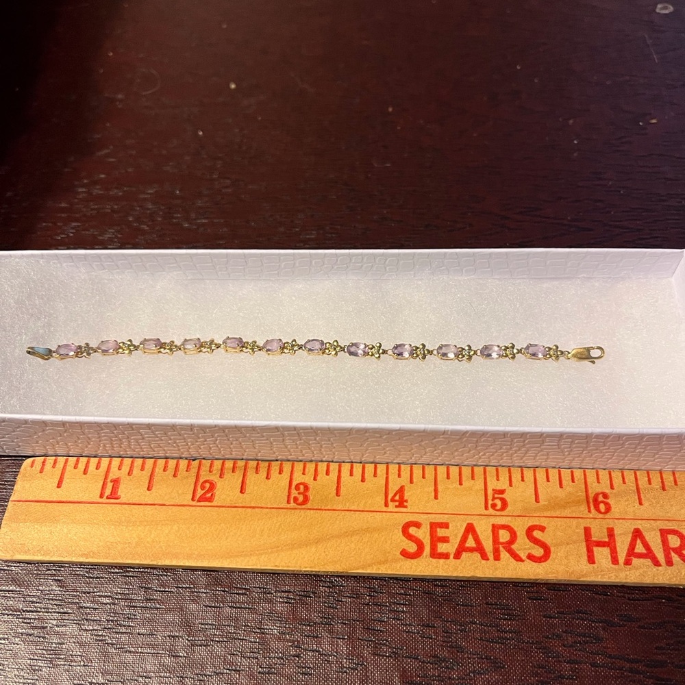 Amethyst and diamond gold tennis bracelet